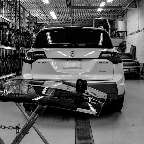 customer SUV waiting in the shop to get back glass replace by Speers Auto Glass Burlington