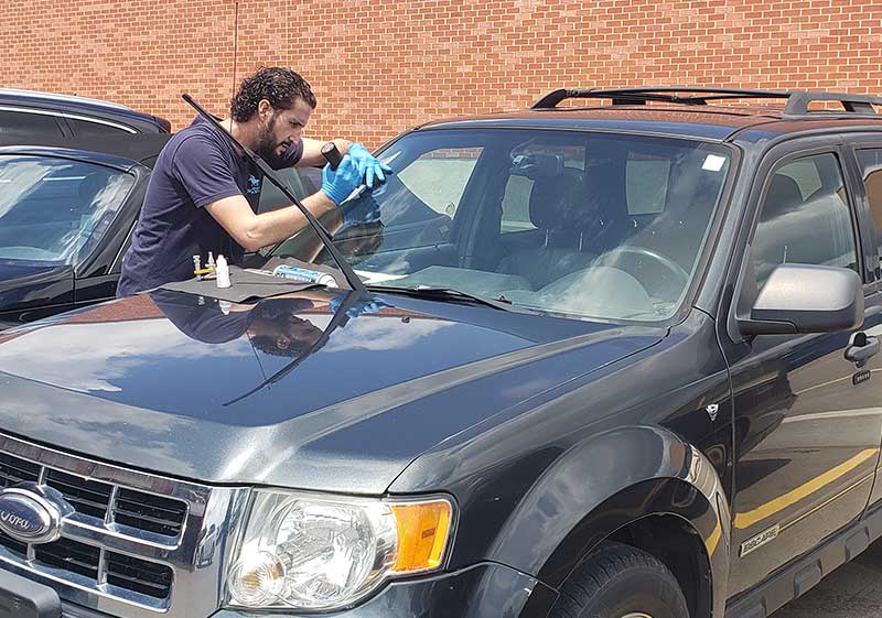 auto glass work gallery repairing chip on windshield Burlington mobile service by Speers Auto Glass