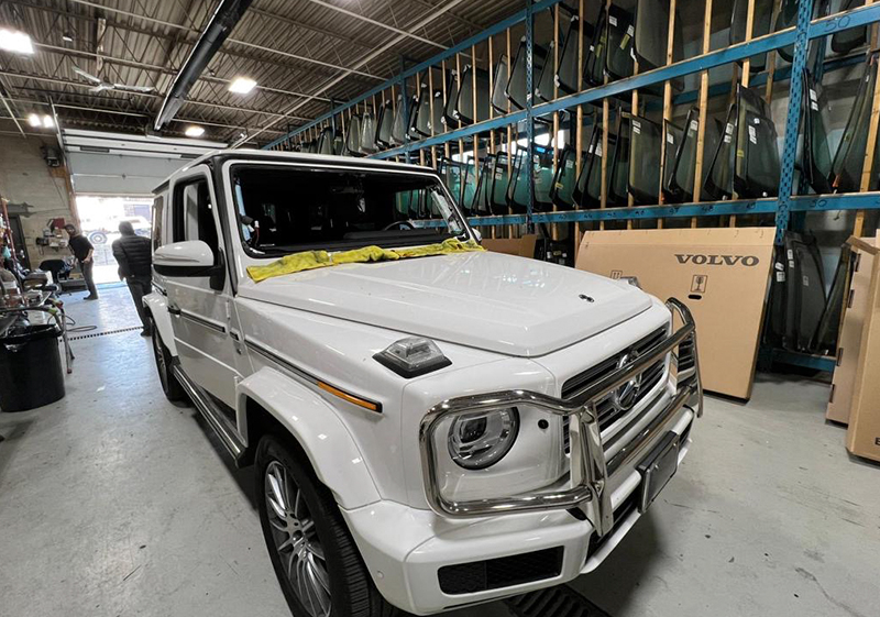 auto glass Mississauga work gallery in shop windshield replace for white Mercedes G Wagon SUV by Speers Auto Glass