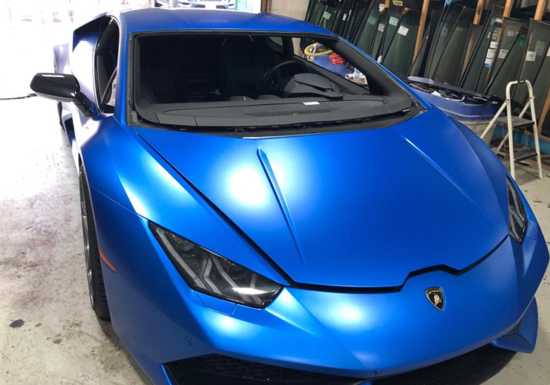 auto glass work gallery in shop windshield replace for blue candy Lamborghini Huracan by Speers Auto Glass Mississauga